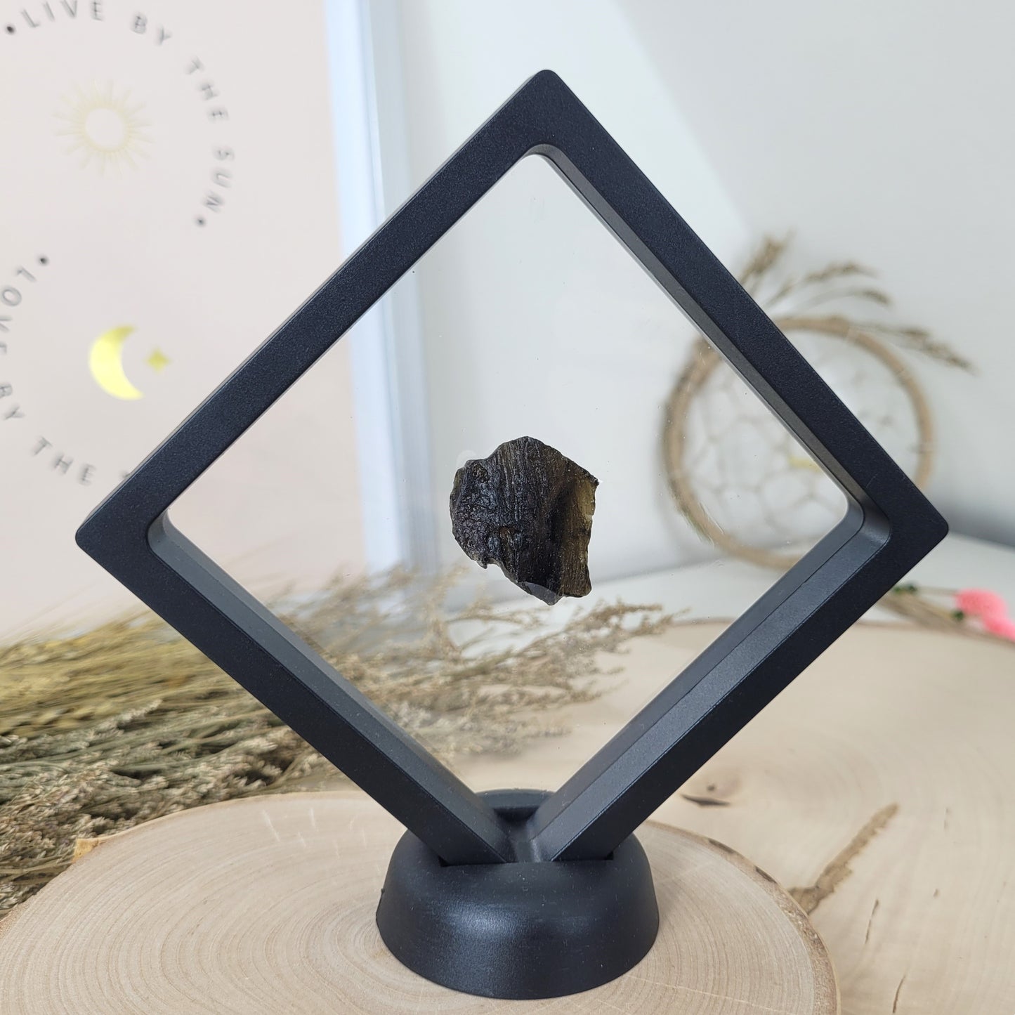 Tektit 2-3cm im Schweberahmen